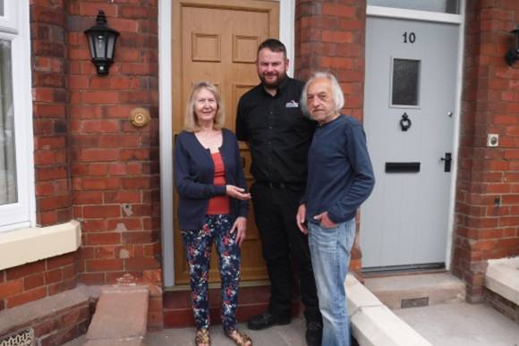 Project Manager for both jobs, Martyn Crouch, hands over the keys to Mr and Mrs Huggon
